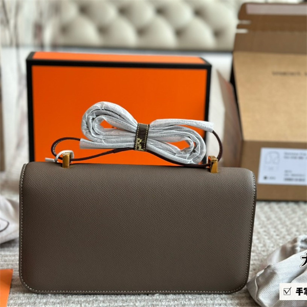 エルメス スーパーコピー バッグ グレー レザー ゴールドバックル 高級感 収納力 オレンジパッケージ HERMES