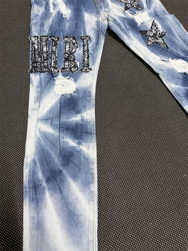 デニムパンツ アミリ スーパーコピー AMIRI ダメージ加工 プリント 個性派 ストリート系 ジーンズ