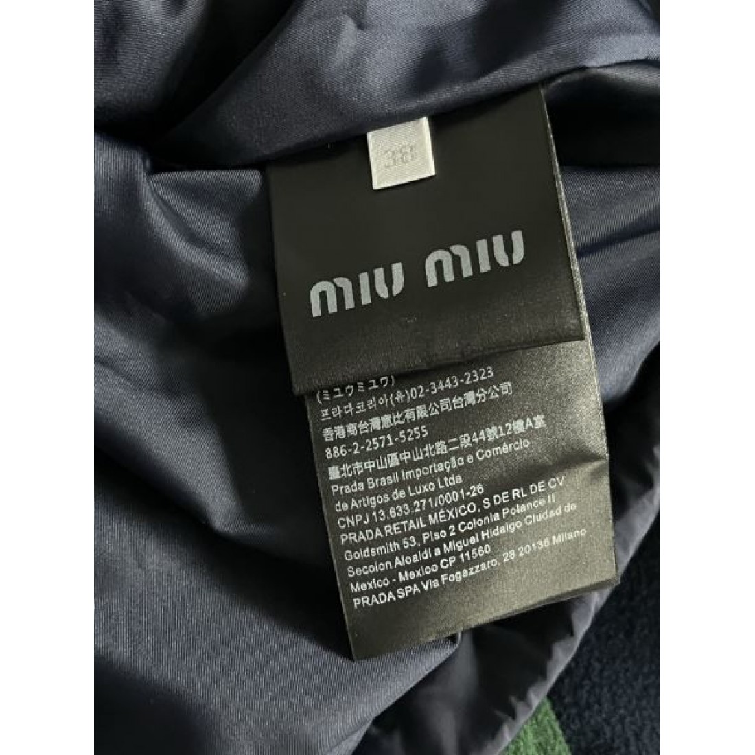 クロップドフォルム ドローコード ポケットデザイン MIU MIU ミュウミュウ コピー ダウンアウター 秋冬コーデ