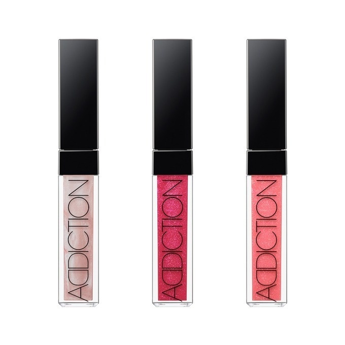 左から) アディクション　リップグロス ピュア Silvery Nights、Burning Pink、Metallic Kiss 各2,500円＋税＜限定色＞